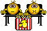Смайлы жуют попкорн в кинотеатре